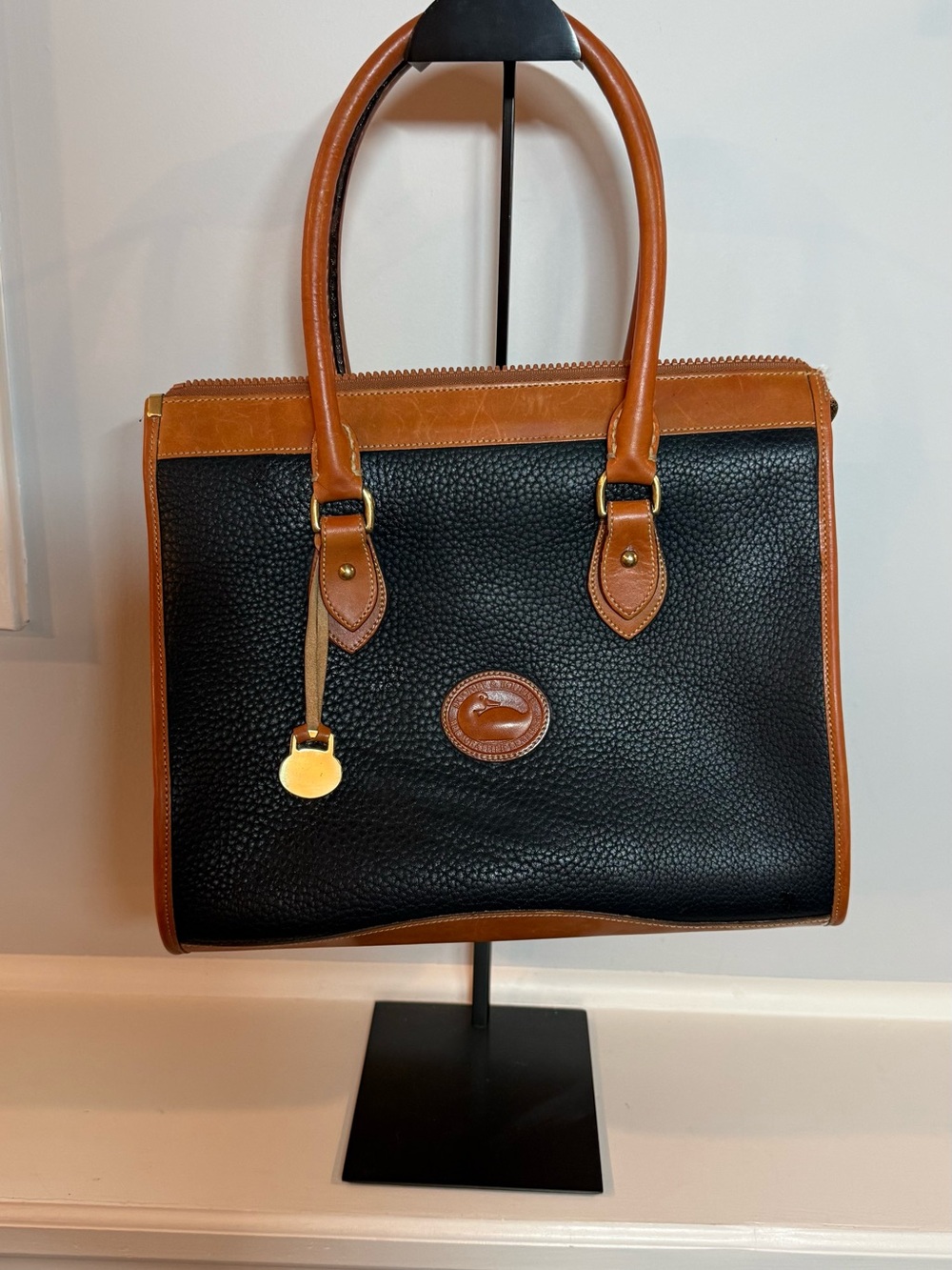 Dooney & Bourke Black Pebble Leather Satchel with Tan Trim